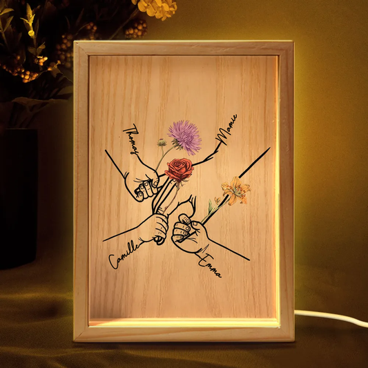 Mains entrelacées – Cadre lumineux personnalisé avec fleurs de naissance et prénoms, cadeau pour maman et mamie