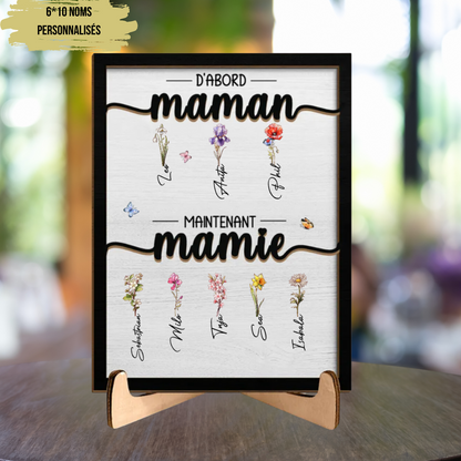D'abord maman, maintenant mamie Plaquette en bois avec fleurs de naissance