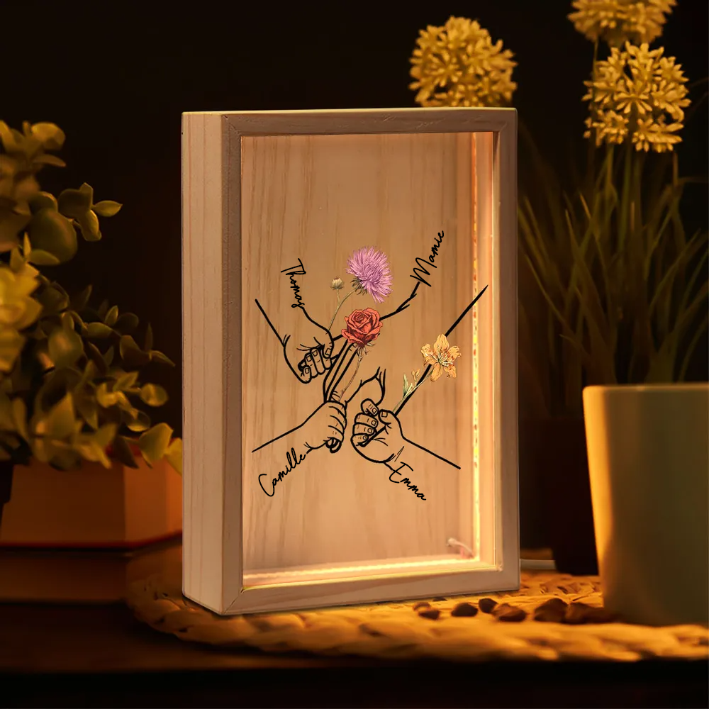 Mains entrelacées – Cadre lumineux personnalisé avec fleurs de naissance et prénoms, cadeau pour maman et mamie