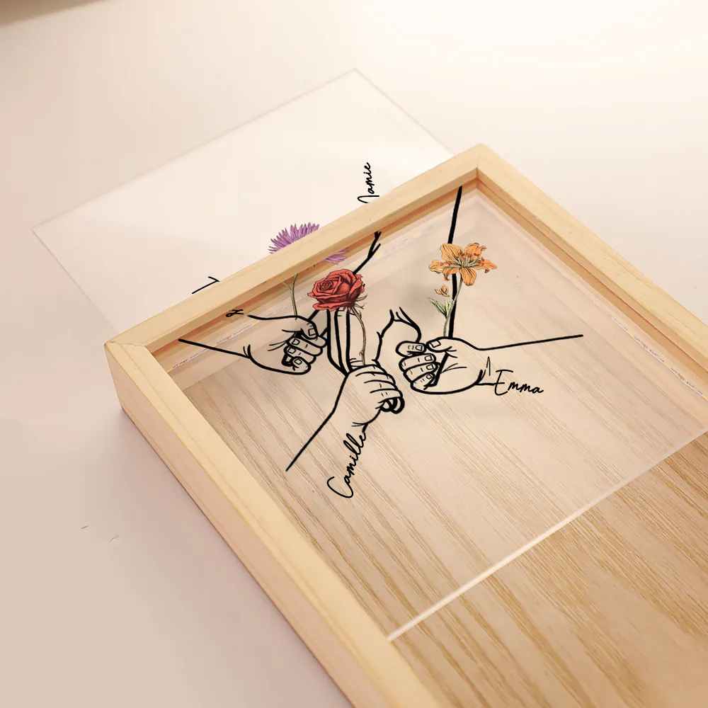 Mains entrelacées – Cadre lumineux personnalisé avec fleurs de naissance et prénoms, cadeau pour maman et mamie