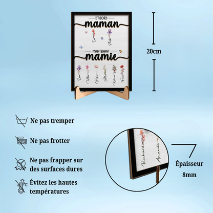 D'abord maman, maintenant mamie Plaquette en bois avec fleurs de naissance